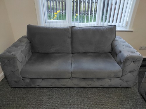 Grey velvet two seater sofa - two,